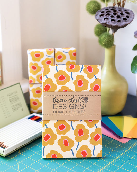 Mod Flowers Yellow Journal – Softcover Dot Grid Notebook with Hand-Drawn Floral Cover, Recycled Paper, and School-Building Mission