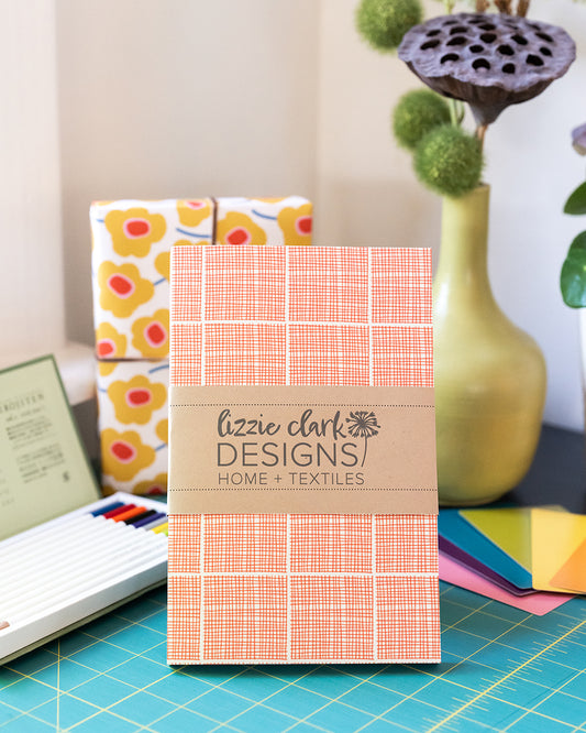 Red Hatch Journal – Softcover Dot Grid Notebook with Hand-Drawn Cover, Recycled Paper, and School-Building Mission