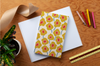 Mod Flowers Yellow Journal – Softcover Dot Grid Notebook with Hand-Drawn Floral Cover, Recycled Paper, and School-Building Mission
