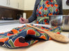Rose Hips Tea Towel – Bold Hand-Drawn Floral Linen for a Colorful Kitchen